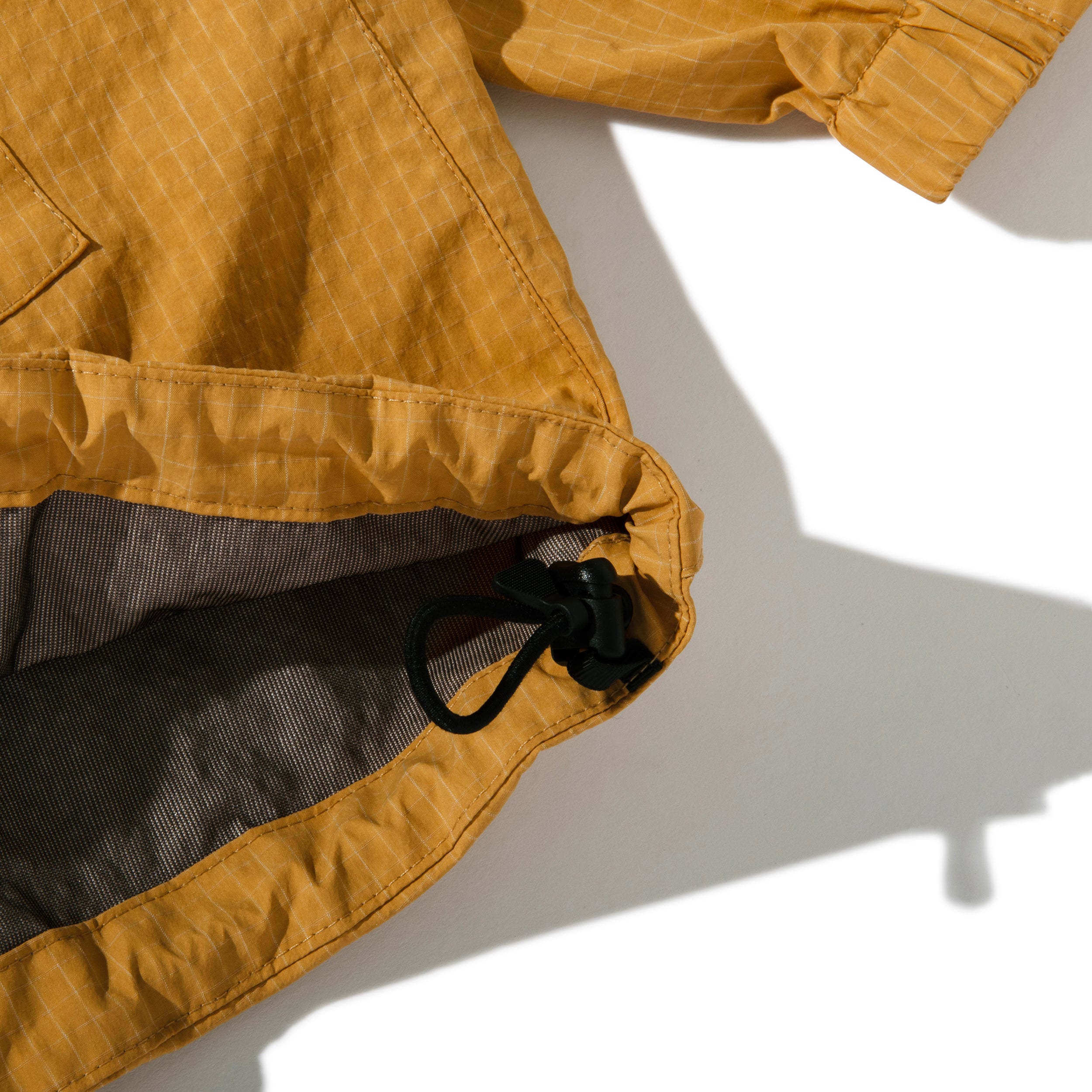 Acy｜NYLON ANORAK V2｜MUSTARD